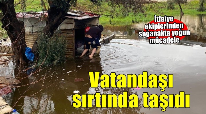 İtfaiye eri vatandaşı sırtında taşıdı