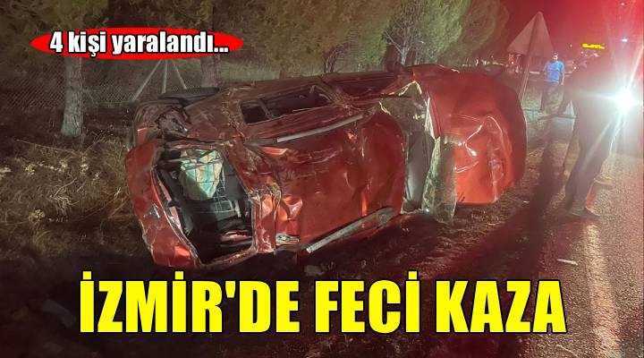 İzmir de devrilen otomobildeki 4 kişi yaralandı