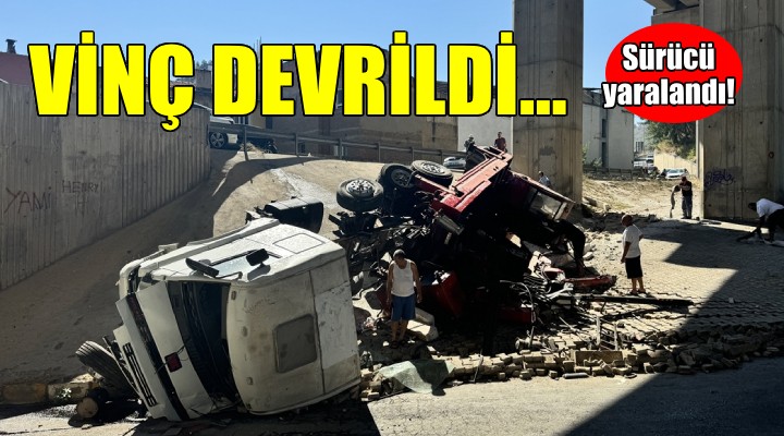 İzmir de devrilen vincin sürücüsü yaralandı