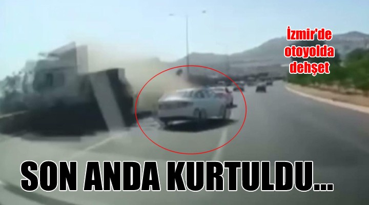 İzmir de otoyolda dehşet! TIR ın altında kalmaktan son anda kurtuldu!