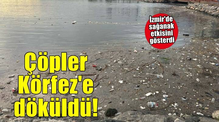 İzmir de sağanak etkisini gösterdi.. Çöpler Körfez e döküldü!