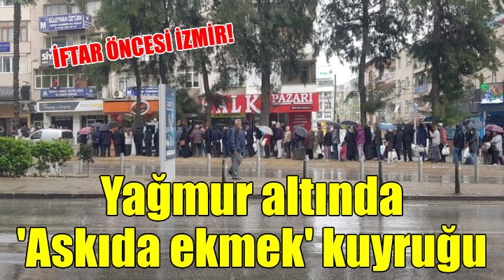 İzmir de sağanak yağmurda  Askıda ekmek  kuyruğu