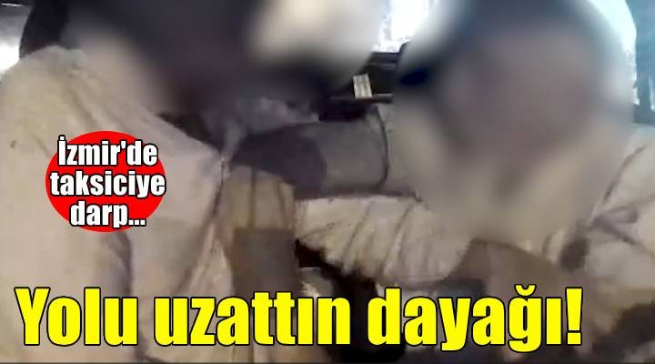 İzmir de yolcunun  yolu uzattın  iddiasıyla taksiciyi darbetmesi araç içi kamerasında