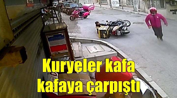 Kafa kafaya çarpışan motosikletli iki kuryeyi  kask  kurtardı