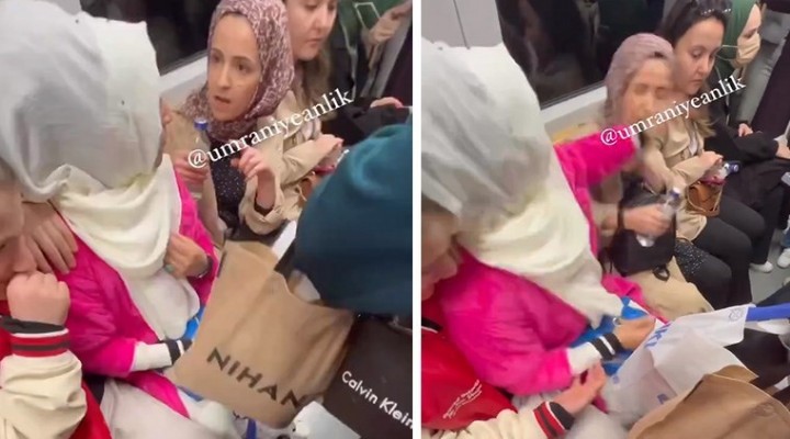 Metroda başörtülü iki kadının kavgası tokatla bitti