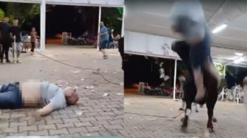 Boğaya para atmak istedi, boynuz darbesiyle havaya uçtu!