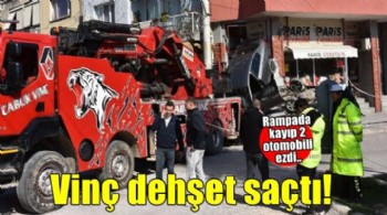 İzmir'de vinç dehşet saçtı! Rampada kayıp 2 otomobili ezdi..
